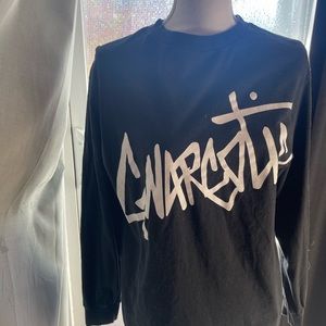 Brand is Gnarcotic size medium color is black